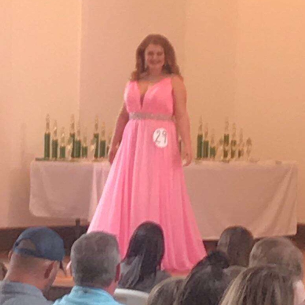 Pink pageant or prom dress.
